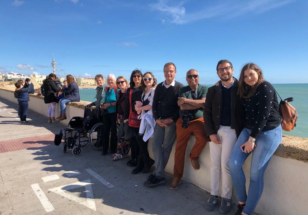 Day trip Bodega visit in Jerez and sightseeing in Cádiz, tour group on seafront in Cádiz